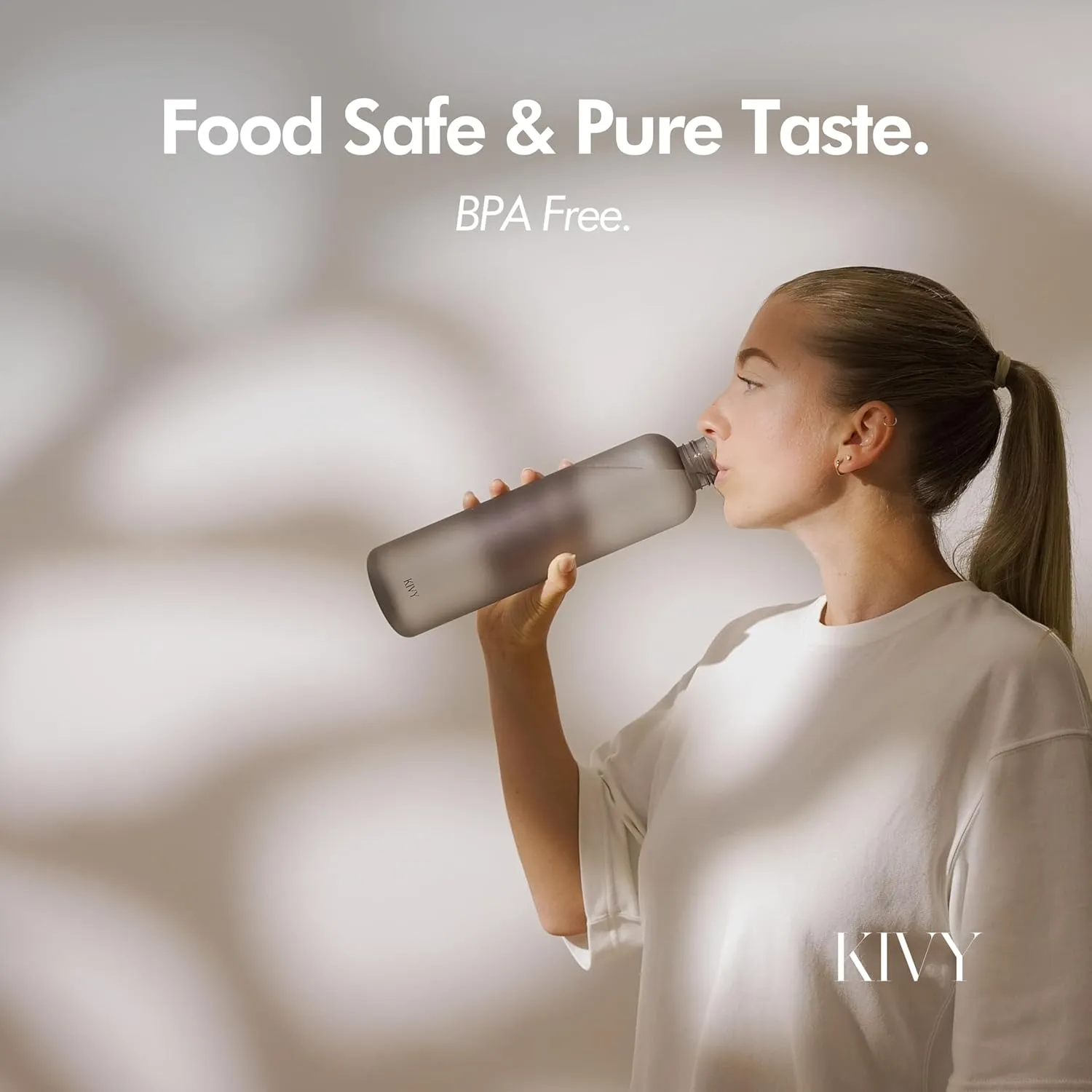 KIVY Slim Water Bottle 32oz [Lightweight & Shatterproof] Fits Backpack & Cupholder for Travel, Sports, School, Gym - Clear water bottle with measurements - Transparent Tritan Beige - Dishwasher Safe
